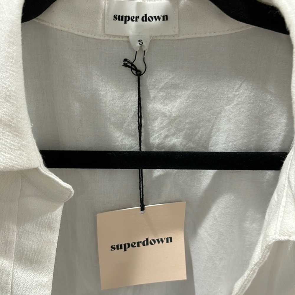 Super cute swim coverup or even a romper. NWT attached.